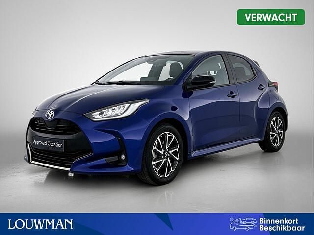 Blauw metallic Gebruikt 2021 Toyota Yaris Edition Hatchback | € 20.950 (Eerlijke prijs) - Afbeelding 1/4
