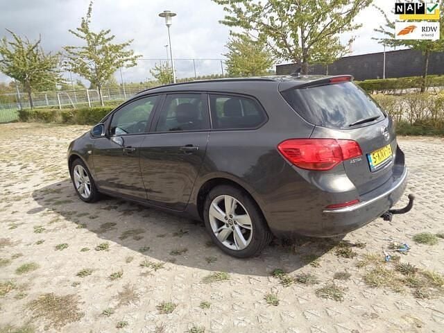 Grijs Gebruikt 2013 Opel Astra Business Stationwagen | € 3.499 (Eerlijke prijs) - Afbeelding 1/4