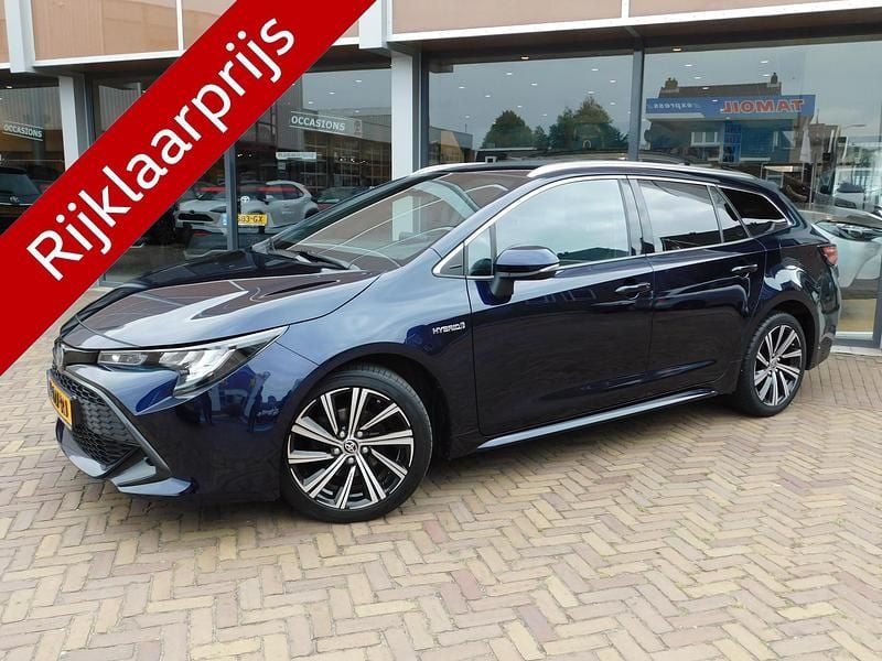 Blauw Gebruikt 2021 Toyota Corolla Stationwagen | € 23.750 (Eerlijke prijs) - Afbeelding 1/4