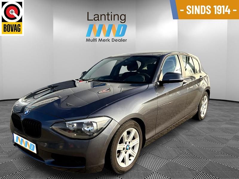 Grijs Gebruikt 2012 BMW 114 Comfort Edition Hatchback | € 7.198 (Eerlijke prijs) - Afbeelding 1/4