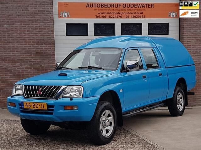 Blauw Gebruikt 2002 Mitsubishi L200 Instyle Pickup | € 9.950 - Afbeelding 1/4