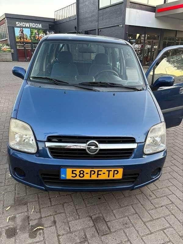 Blauw Gebruikt 2004 Opel Agila Enjoy MPV | € 1.300 (Eerlijke prijs) - Afbeelding 1/4