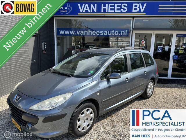 Grijs, metallic lak Gebruikt 2007 Peugeot 307 Stationwagen | € 2.450 (Iets duurder) - Afbeelding 1/4