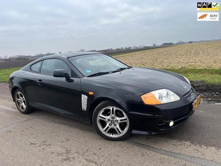 Occasion Hyundai Coupé Dynamiq 143 PK (105 kW) 2005 Zwart Coupé