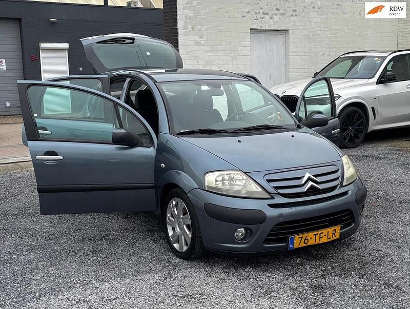 Blauw (metallic) Gebruikt 2006 Citroën C3 Exclusive Hatchback | € 1.999 (Goede deal) - Afbeelding 1/4
