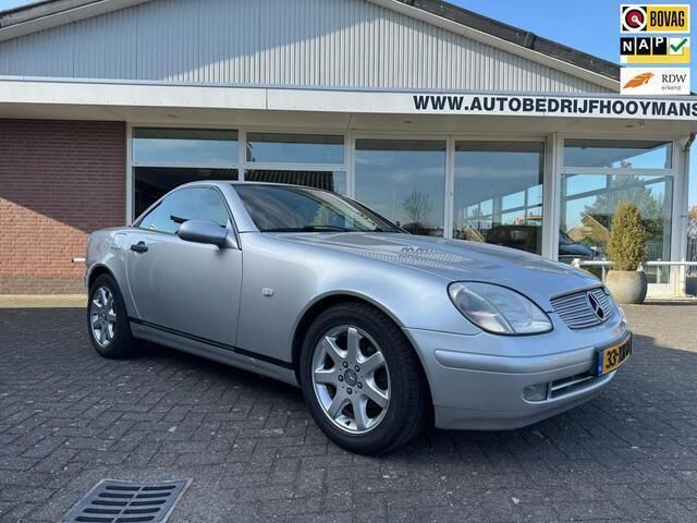 Grijs, metallic lak Gebruikt 1997 Mercedes SLK200 Cabriolet | € 4.750 (Eerlijke prijs) - Afbeelding 1/4