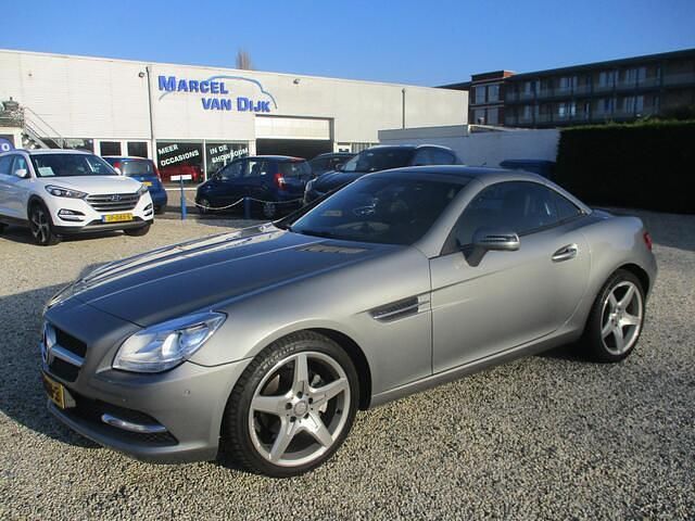 Grijs (metallic) Occasion 2012 Mercedes SLK200 Cabriolet | € 19.950 (Eerlijke prijs) - Afbeelding 1/4
