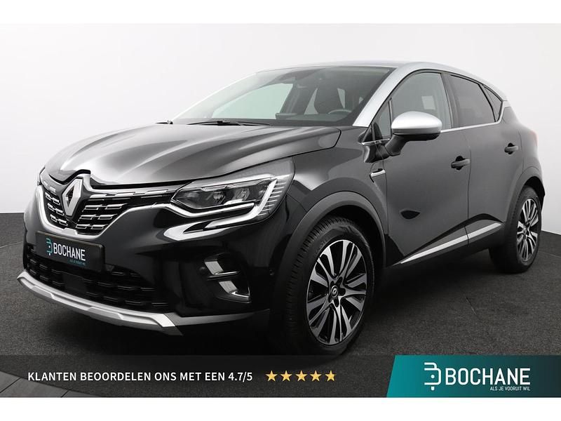 Twotone noir étoilé (gne) & gris higland (kqa) Occasion 2023 Renault Captur Iconic SUV | € 25.400 (Eerlijke prijs) - Afbeelding 1/4