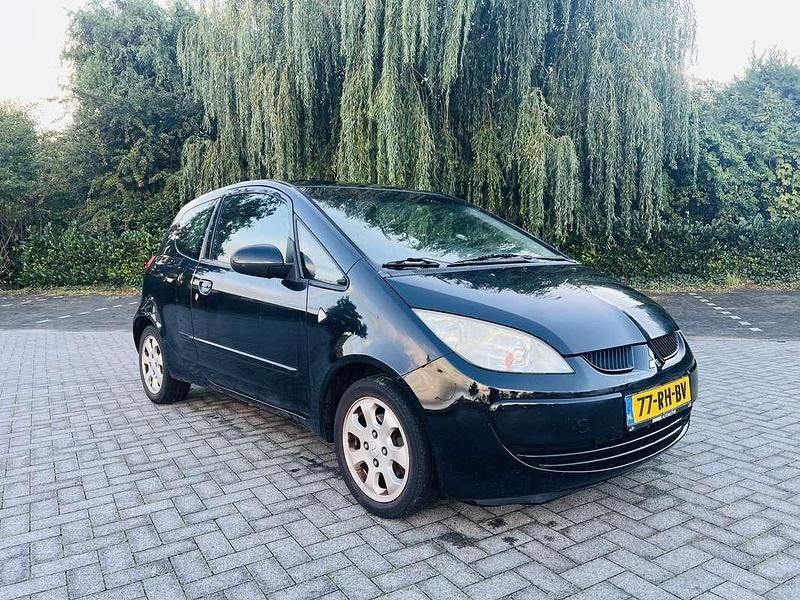 Zwart Gebruikt 2005 Mitsubishi Colt Hatchback | € 1.100 (Eerlijke prijs) - Afbeelding 1/4