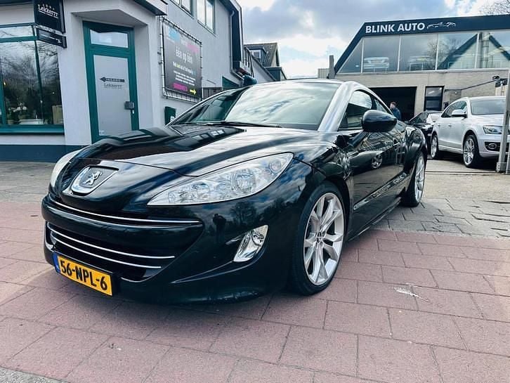 Zwart, metallic lak Gebruikt 2010 Peugeot RCZ Coupé | € 7.999 (Iets duurder) - Afbeelding 1/4