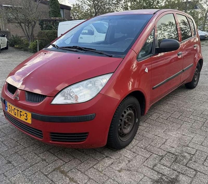 Rood Gebruikt 2008 Mitsubishi Colt Stationwagen | € 999 (Super prijs) - Afbeelding 1/4