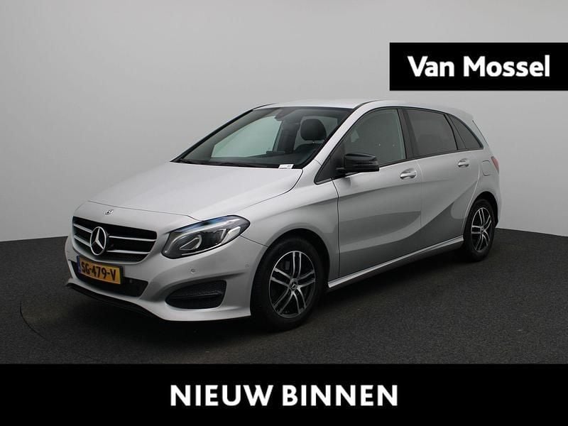 Grijs Gebruikt 2018 Mercedes B180 Ambition MPV | € 16.900 (Eerlijke prijs) - Afbeelding 1/4