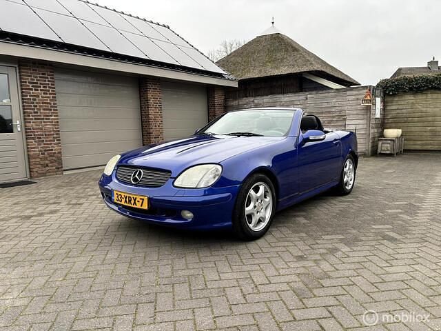 Blauw Occasion 2000 Mercedes SLK320 Cabriolet | € 5.750 (Eerlijke prijs) - Afbeelding 1/4
