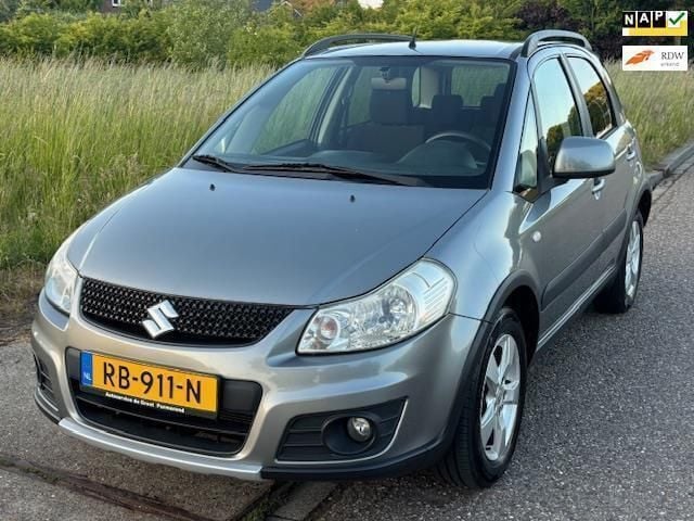 Grijs Gebruikt 2012 Suzuki SX4 Exclusive MPV | € 7.999 (Goede deal) - Afbeelding 1/4