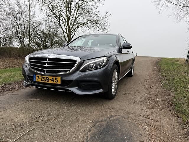 Grijs Gebruikt 2015 Mercedes C180 Stationwagen | € 9.500 - Afbeelding 1/4