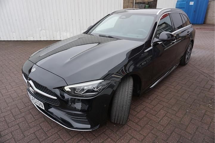 Occasion Mercedes C300 AMG line 2022 Zwart (metallic) Stationwagen