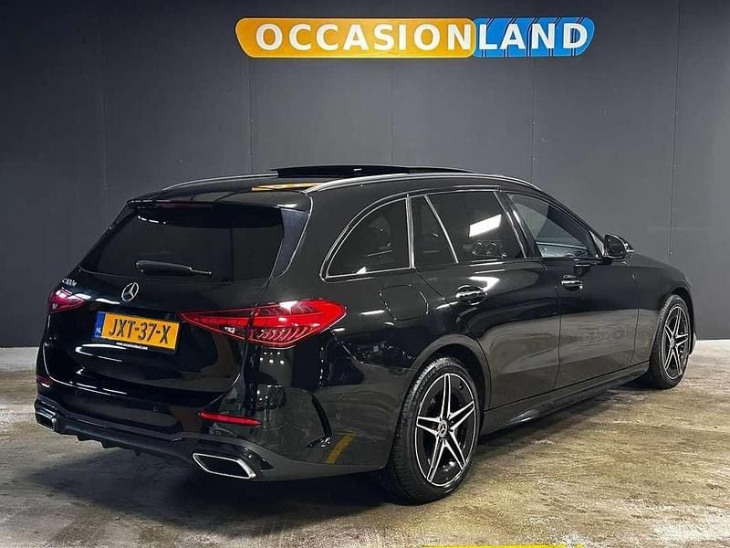 Occasion Mercedes C300e AMG line 204 PK (150 kW) 2022 Zwart Stationwagen