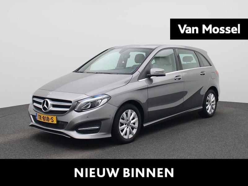 Grijs Gebruikt 2018 Mercedes B180 Ambition MPV | € 19.900 (Eerlijke prijs) - Afbeelding 1/4