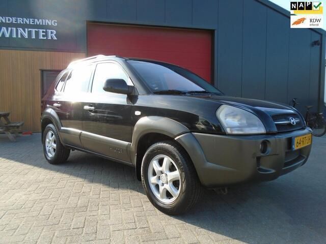 Zwart Gebruikt 2005 Hyundai Tucson Dynamiq SUV | € 2.450 (Eerlijke prijs) - Afbeelding 1/4
