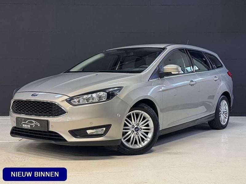 Grijs Gebruikt 2018 Ford Focus Trend Stationwagen | € 12.800 (Goede deal) - Afbeelding 1/4