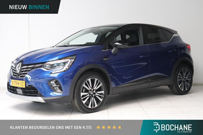 Twotone bleu iron (rqh) & noir étoilé (gne) Gebruikt 2024 Renault Captur Iconic SUV | € 28.900 (Iets duurder) - Afbeelding 1/4
