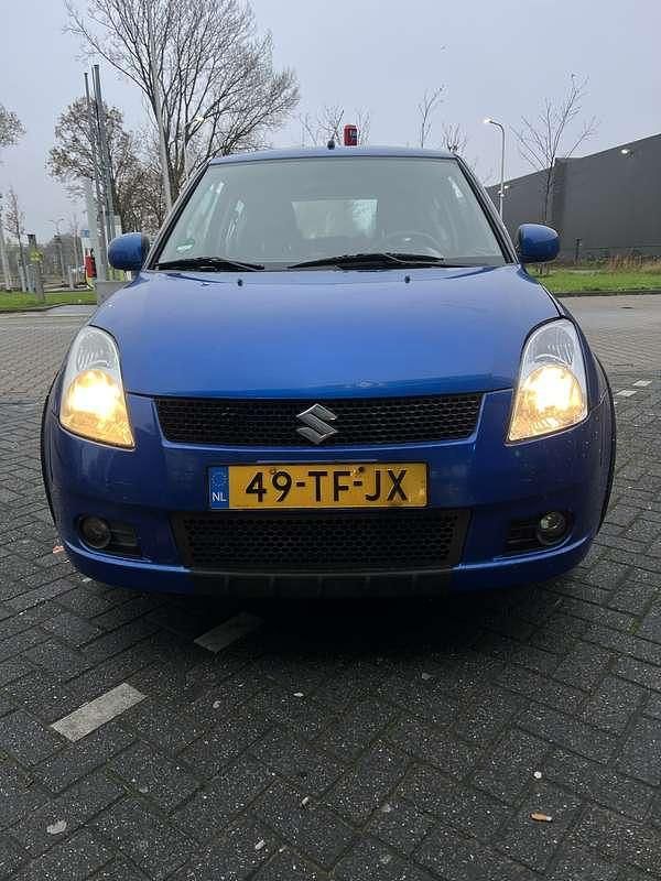 Blauw Gebruikt 2006 Suzuki Swift Sedan | € 1.600 (Eerlijke prijs) - Afbeelding 1/4