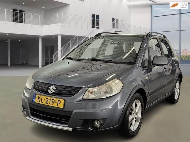 Grijs Gebruikt 2009 Suzuki SX4 Exclusive MPV | € 3.850 (Eerlijke prijs) - Afbeelding 1/4