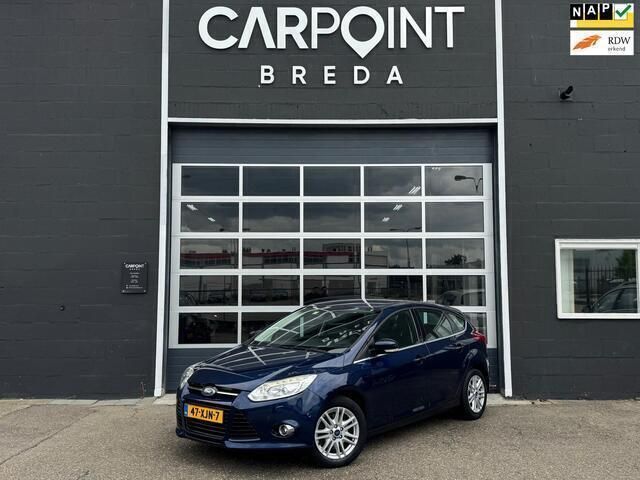 Blauw Gebruikt 2012 Ford Focus Titanium Hatchback | € 5.445 (Iets duurder) - Afbeelding 1/4