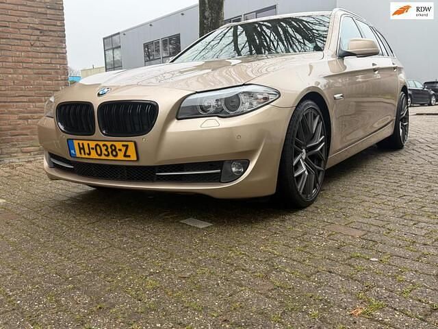 Occasion BMW 520 Executive 163 PK (119 kW) 2011 Geel (metallic) Stationwagen