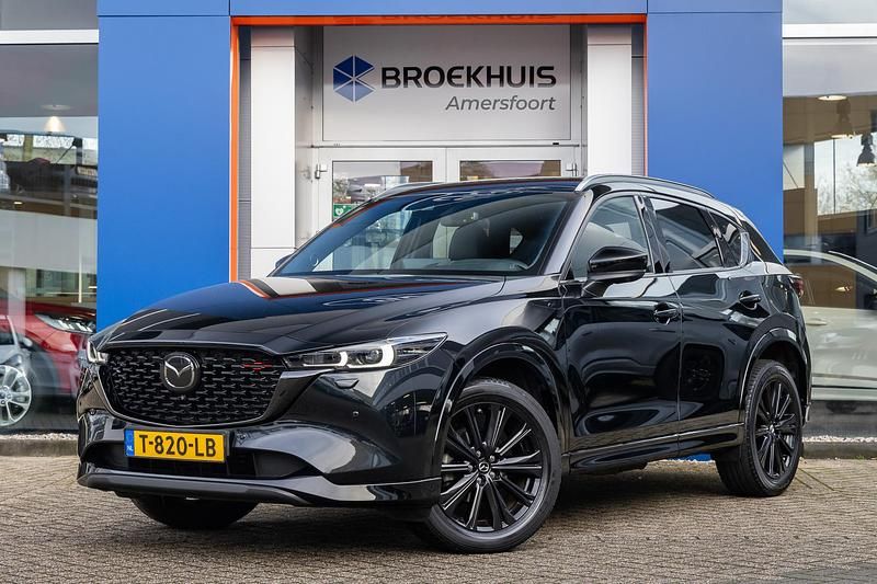 Zwart Gebruikt 2023 Mazda CX-5 Signature SUV | € 39.895 (Eerlijke prijs) - Afbeelding 1/4
