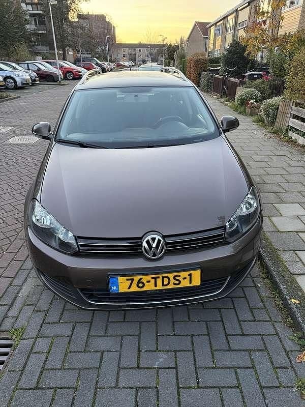 Bruin Gebruikt 2012 VW Golf VII Comfortline Stationwagen | € 3.750 (Iets duurder) - Afbeelding 1/4