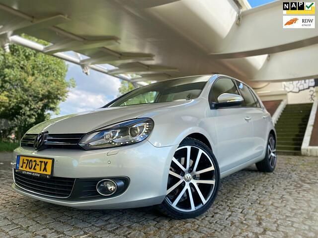 Grijs Gebruikt 2012 VW Golf VII Highline Stationwagen | € 8.950 (Eerlijke prijs) - Afbeelding 1/4