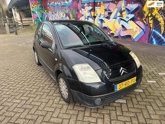 Zwart Occasion 2005 Citroën C2 Prestige Hatchback | € 995 (Goede deal) - Afbeelding 1/4