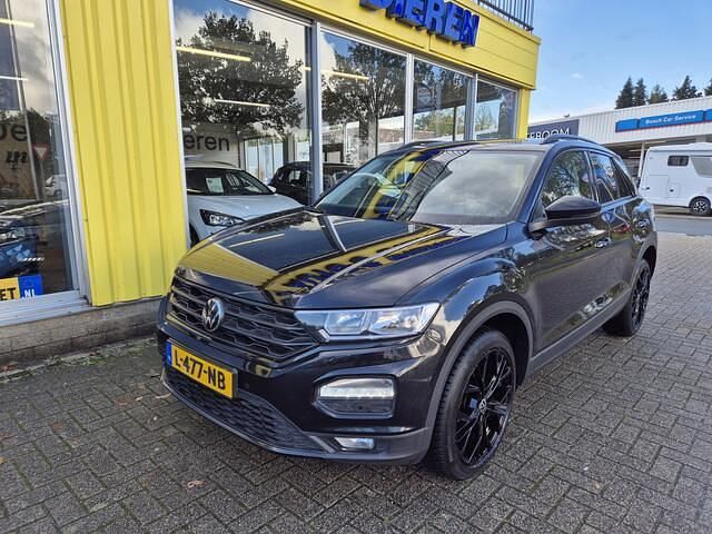 Zwart Gebruikt 2021 VW T-Roc Style SUV | € 19.999 (Eerlijke prijs) - Afbeelding 1/4
