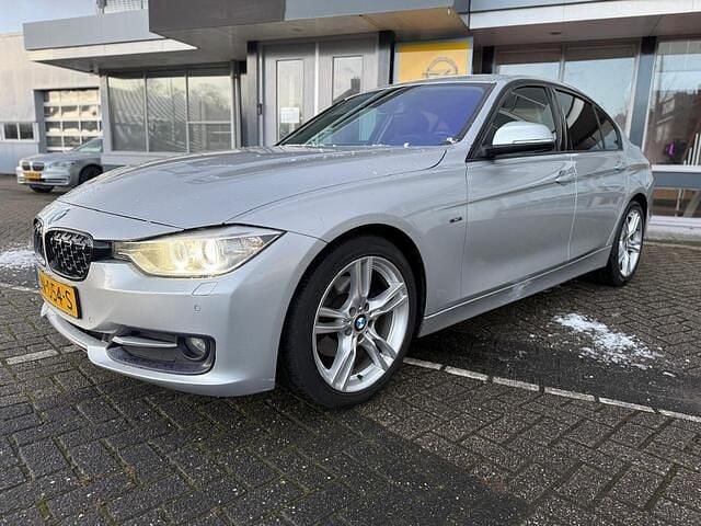 Grijs Occasion 2012 BMW 320 Executive Sedan | € 6.950 (Iets duurder) - Afbeelding 1/4