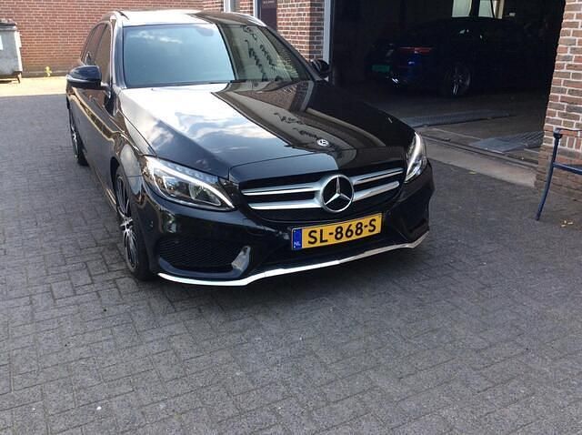 Zwart Gebruikt 2018 Mercedes C180 Sport Edition Stationwagen | € 19.600 (Eerlijke prijs) - Afbeelding 1/4