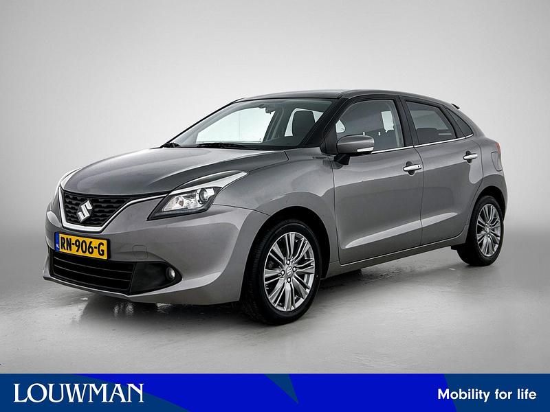 Grijs metallic Occasion 2018 Suzuki Baleno Hatchback | € 10.940 (Eerlijke prijs) - Afbeelding 1/4