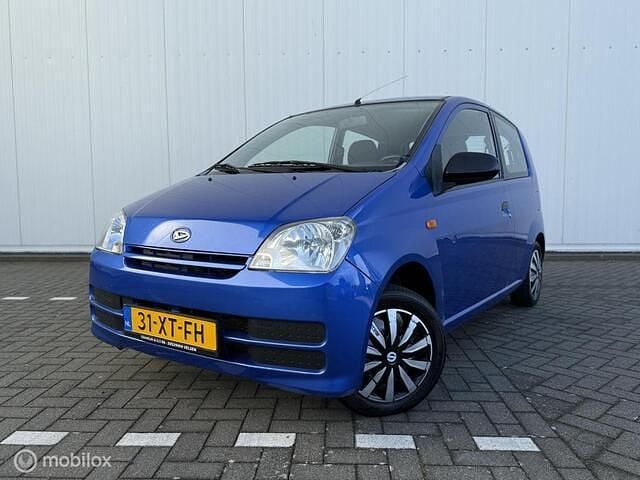 Occasion Daihatsu Cuore 58 PK (42 kW) 2007 Blauw Hatchback