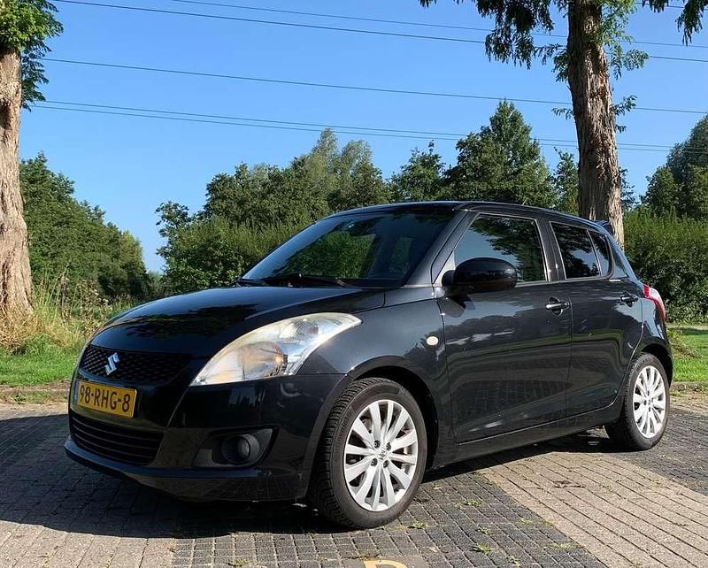 Zwart Gebruikt 2011 Suzuki Swift Exclusive Hatchback | € 5.500 (Goede deal) - Afbeelding 1/4