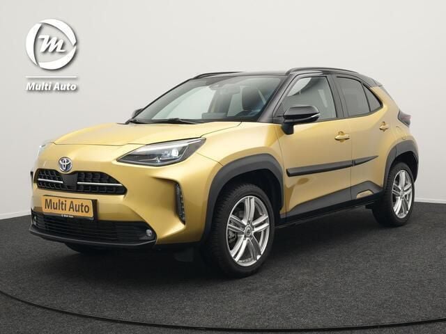 Goud, metallic lak Gebruikt 2023 Toyota Yaris Cross Executive SUV | € 27.440 (Goede deal) - Afbeelding 1/4