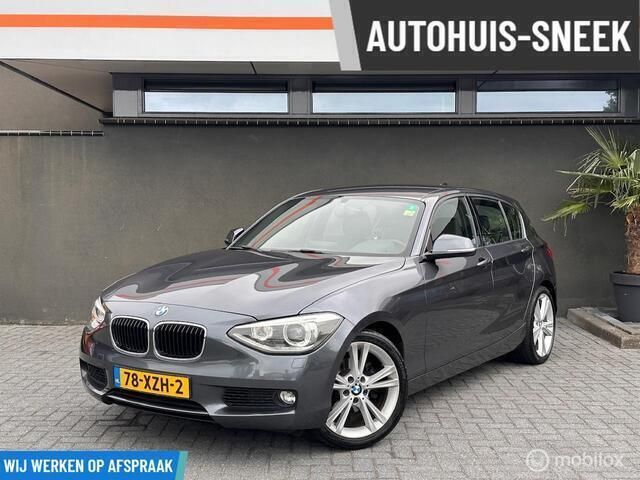 Grijs Gebruikt 2012 BMW 118 Comfort Edition Hatchback | € 10.950 (Iets duurder) - Afbeelding 1/4