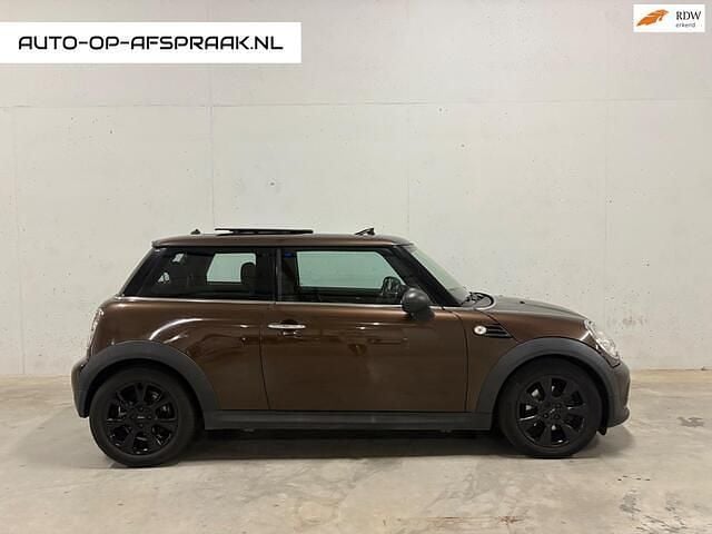 Bruin Gebruikt 2011 Mini Cooper Chili Hatchback | € 3.333 (Super prijs) - Afbeelding 1/4