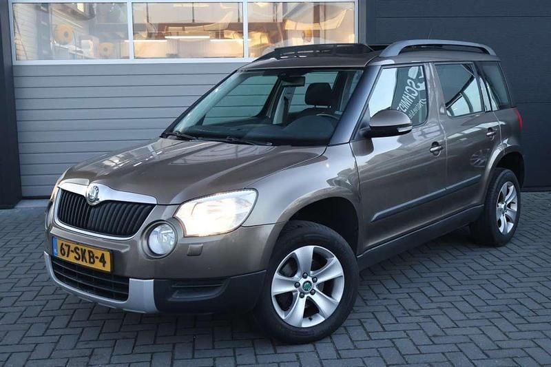 Bruin Occasion 2011 Skoda Yeti Ambition SUV | € 6.995 (Eerlijke prijs) - Afbeelding 1/4
