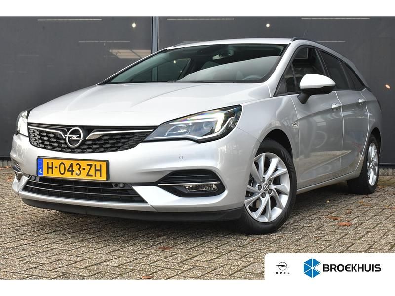 Grijs Gebruikt 2020 Opel Astra Edition Stationwagen | € 12.395 (Goede deal) - Afbeelding 1/4