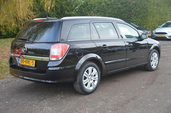 Occasion Opel Astra Cosmo 116 PK (85 kW) 2009 Zwart (metallic) Stationwagen