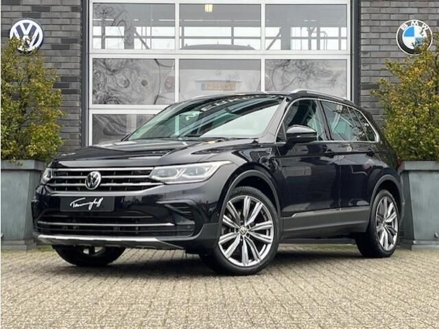 Zwart, metallic lak Gebruikt 2021 VW Tiguan Elegance SUV | € 28.895 (Goede deal) - Afbeelding 1/4