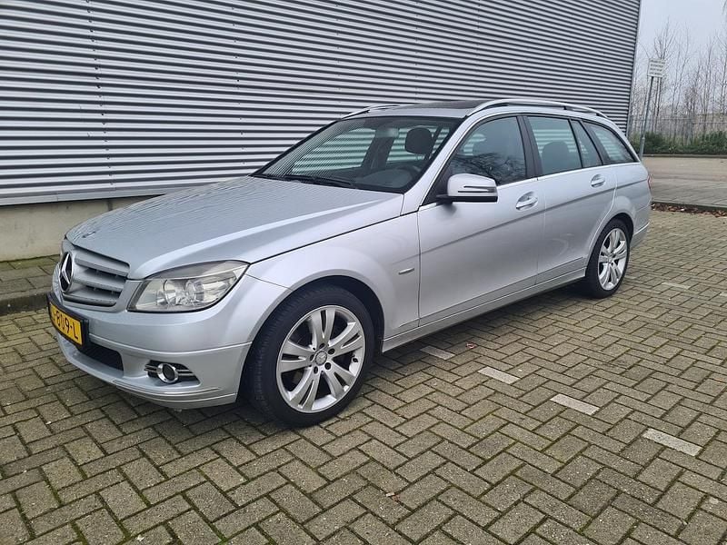 Grijs Occasion 2009 Mercedes C200 Avantgarde Stationwagen | € 8.500 (Eerlijke prijs) - Afbeelding 1/4