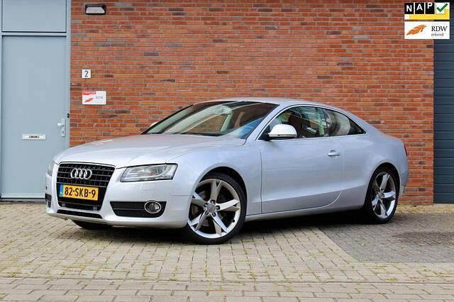 Grijs Gebruikt 2009 Audi A5 Premium Coupé | € 7.295 (Eerlijke prijs) - Afbeelding 1/4