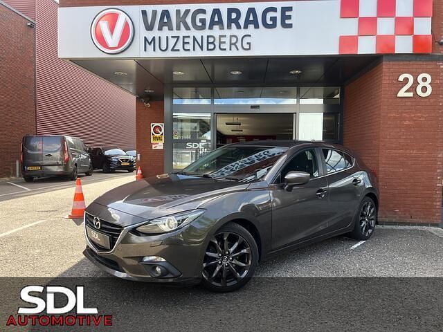 Grijs Gebruikt 2016 Mazda 3 Hatchback | € 13.945 (Eerlijke prijs) - Afbeelding 1/4