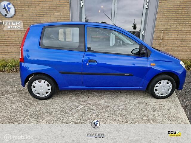 Occasion Daihatsu Cuore 59 PK (43 kW) 2008 Blauw Hatchback